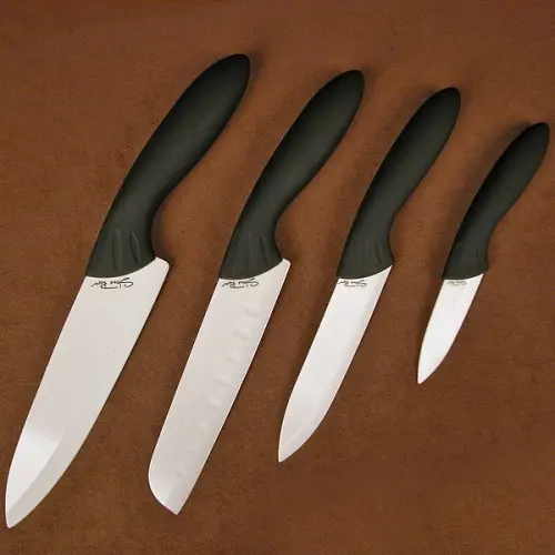 4-Piece Ceramic Knife Set – Santoku, Paring, Chef, And Utility In White 1